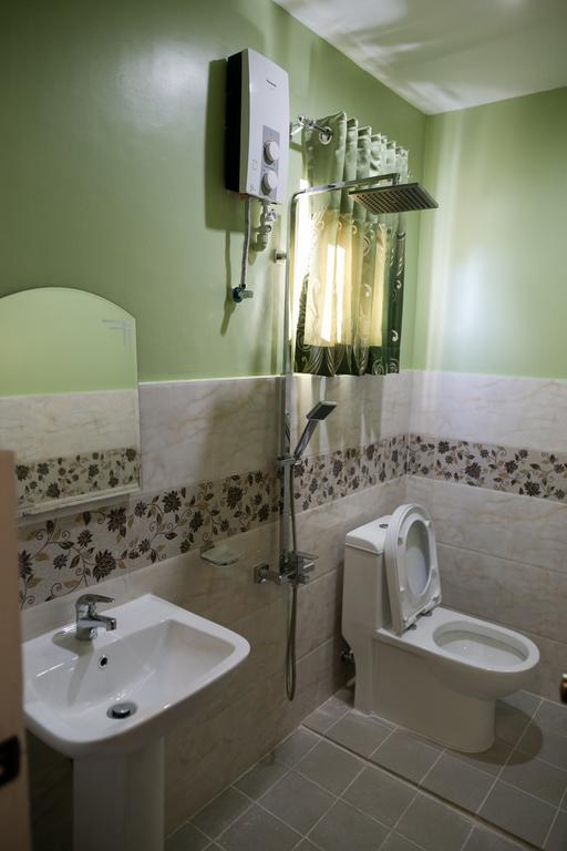 Luzmin Bh - Cottages And Bungalows Oslob Quarto foto